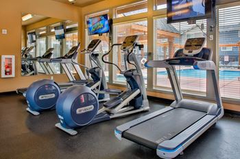 24-Hr fitness center with cardio and free weights
