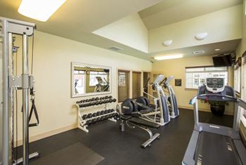 24-Hr fitness center with cardio and free weights