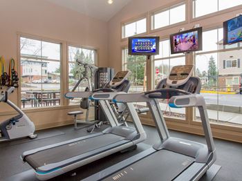 24-Hour fitness studio with cardio & free weights
