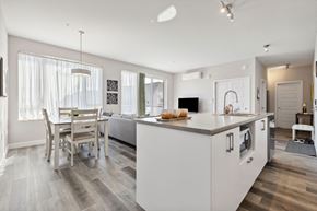 Thurso apartment for rent - A modern kitchen with a dining table and chairs.