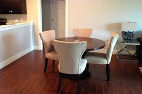 Saint John townhouse for rent - A dining room with a table and chairs.