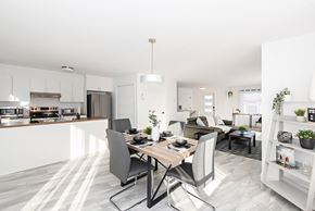 Val D'or apartment for rent - A modern kitchen with a dining table and chairs.