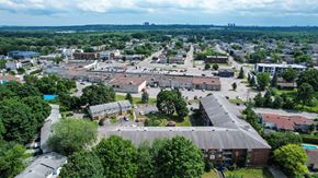 Gatineau apartment for rent - A bird's eye view of a town with a large building in the center.