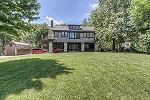 Kansas City apartment for rent - a large lawn in front of a house