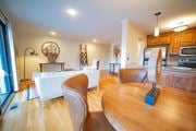 Kansas City apartment for rent - a dining room and living room with a table and chairs