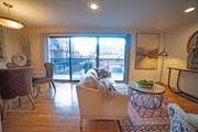 Kansas City apartment for rent - a living room with a sliding glass door to a balcony