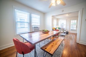 Kansas City apartment for rent - a dining room with a wooden table and chairs