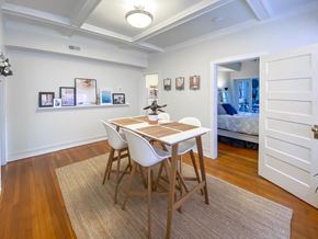 Kansas City apartment for rent - a dining room with a table and chairs next to a bedroom
