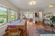 Kansas City apartment for rent - A dining room with a long table and chairs.