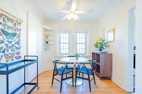 Kansas City apartment for rent - A dining room with a table and chairs.