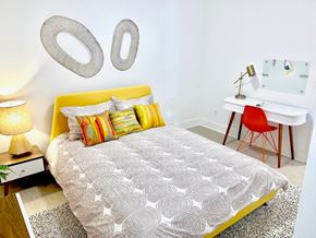 Ferndale apartment for rent - a bedroom with a bed and a desk with a chair