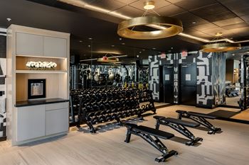24 Hour fitness center with precor equipment and free-weights
