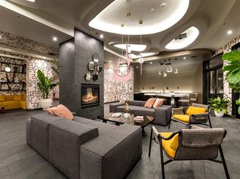 Contemporary social lounge with entertainment kitchen, co-working spaces, and led tvs