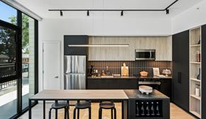Los Angeles apartment for rent - A modern kitchen with a black and white color scheme.