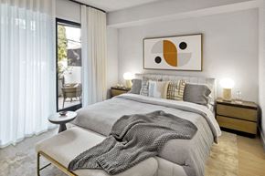 West Hollywood apartment for rent - a bedroom with a bed and a sliding glass door