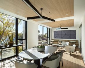 West Hollywood apartment for rent - a dining room with a white table and chairs