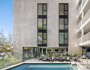 West Hollywood apartment for rent - a swimming pool in the middle of a building