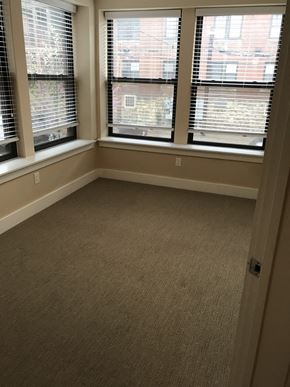 Saint Louis apartment for rent - an empty room with three windows in it