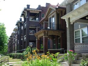 University City apartment for rent - a row of houses with steps and plants in front of them