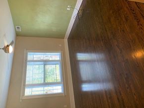 Saint Louis apartment for rent - an empty room with a window and a wooden floor
