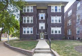 St. Louis apartment for rent - the front of a brick building with a sidewalk in front of it