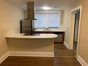 St. Louis apartment for rent - a kitchen with a white counter top and a window