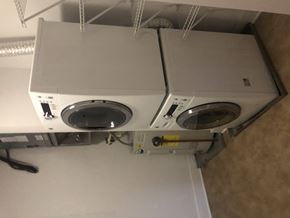 Saint Louis apartment for rent - a washing machine and a dryer stacked on top of each other