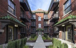 Saint Louis apartment for rent - a sidewalk in front of a brick building