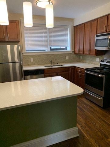 Saint Louis apartment for rent - a kitchen with stainless steel appliances and a white counter top