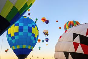 St. Louis apartment for rent - A group of hot air balloons in the sky.