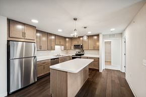 Cambridge apartment for rent - the preserve at ballantyne commons apartment kitchen with stainless steel appliances