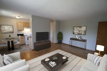 St. Paul apartment for rent - a living room with a couch and a table