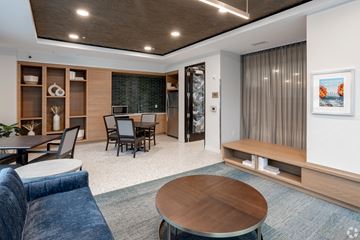 Minneapolis apartment for rent - a living room and dining room with a table and chairs
