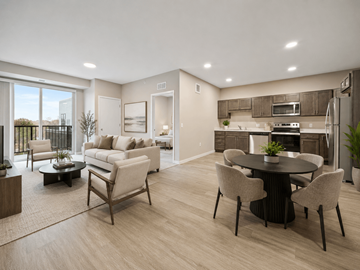 Edina apartment for rent - A modern living room with a dining table and chairs.