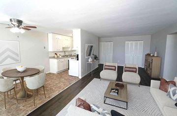 West St. Paul apartment for rent - a living room with a couch and a table