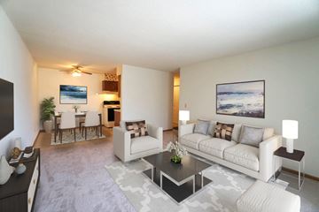 St. Paul apartment for rent - a living room with a couch and a table