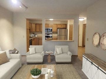White Bear Lake apartment for rent - a living room with a couch and a table