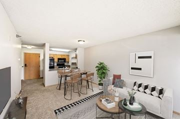Minneapolis apartment for rent - our apartments offer a living room and dining room with a table and chairs