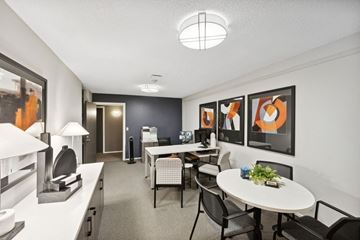 St. Paul apartment for rent - a living room and dining room with a table and chairs