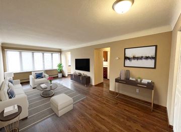St. Paul apartment for rent - a living room with a couch and a table