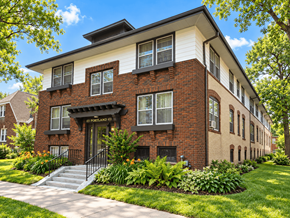 St Paul apartment for rent - A brick building with a black awning and a sign that says