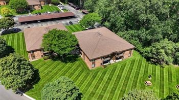 Expansive green space at eastwood village apartments in clinton township, mi.