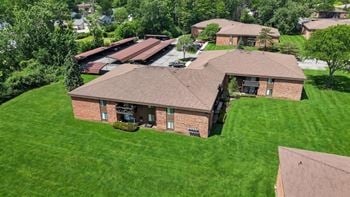 Expansive green space at eastwood village apartments in clinton township, mi.