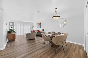 Clinton Township apartment for rent - Open concept Living-Dining Area with natural lighting at Lakeside Village Apartments Clinton Township, MI