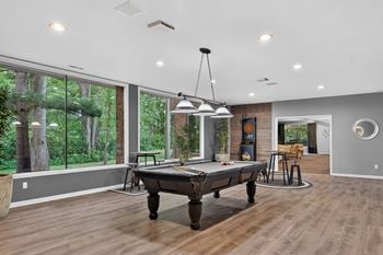 Game and billiards room at eastwood village apartments in clinton township, mi.