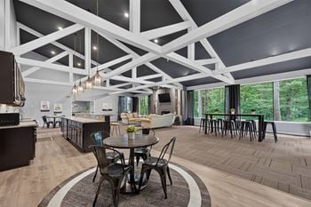 Clubhouse with coworking lounge at eastwood village apartments in clinton township, mi.