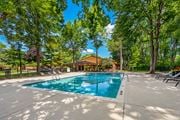 Clinton Township apartment for rent - Heated swimming pool with sundeck at Eastwood Village Apartments in Clinton Township, MI.