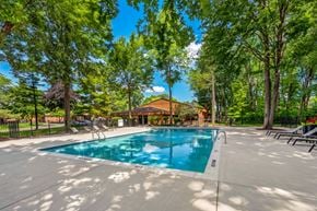 Clinton Township apartment for rent - Heated swimming pool with sundeck at Eastwood Village Apartments in Clinton Township, MI.