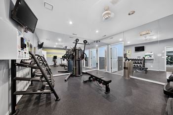 24-Hour fitness center and sauna at eastwood village apartments in clinton township, mi.