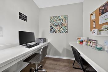 Clubhouse with coworking lounge at eastwood village apartments in clinton township, mi.